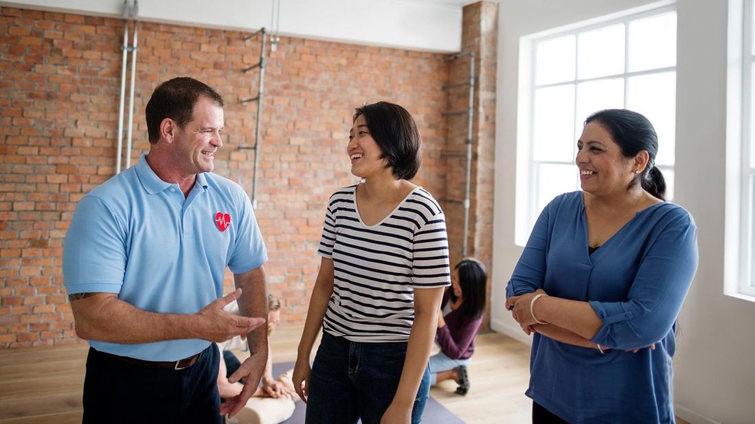Two women getting advice from a professional 